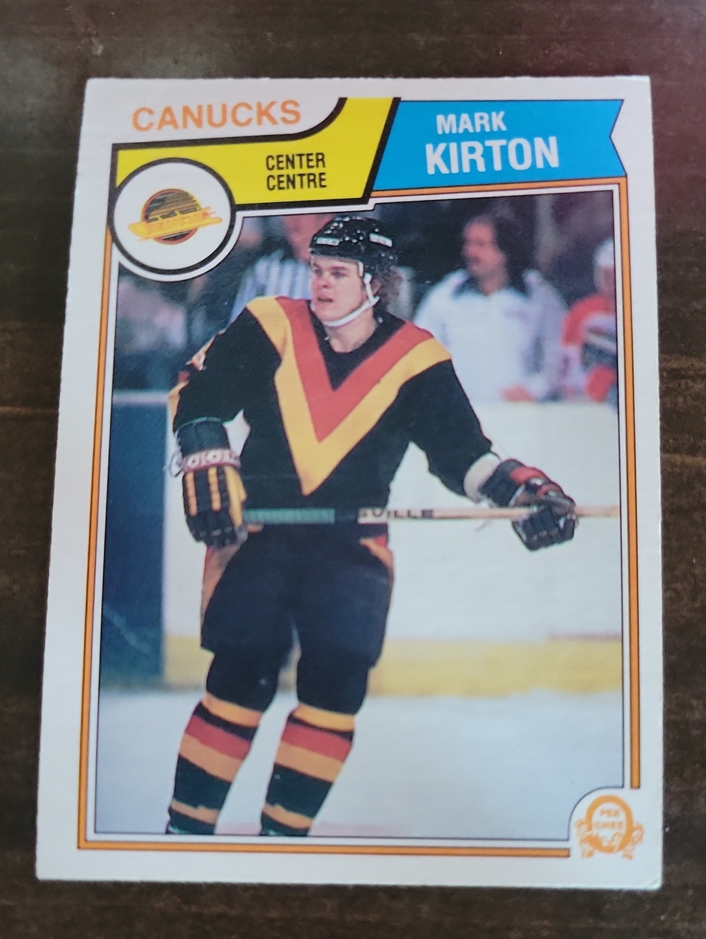 1983/84 OPC Canucks Mark Kirton Hockey Card - Black with Yellow & Red V Detail
